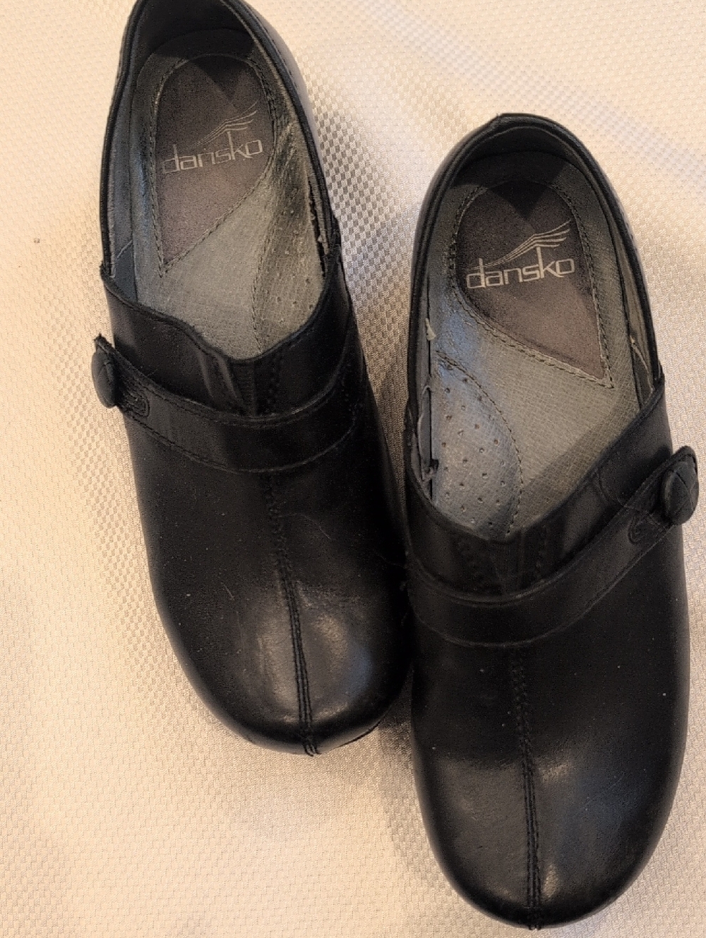 Dansko Women's Black Leather Slip-Ons